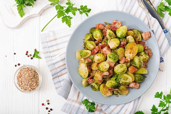 Roasted brussels sprouts with bacon on plate — Stock Image Roasted Brussels Sprouts Bacon Plate Stock Picture