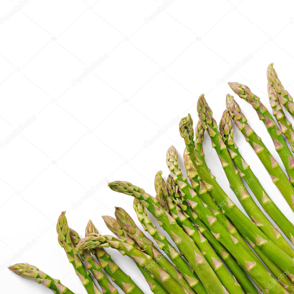 Top view of green fresh asparagus isolated on white background . 
