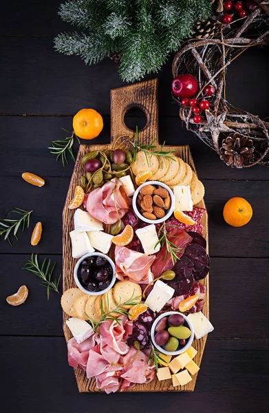 Antipasto Platter Ham Prosciutto Salami Cheese Crackers Olives Wooden Background — Stock Photo, Image