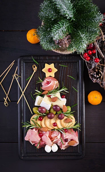 Antipasto Platter Ham Prosciutto Salami Cheese Crackers Olives Wooden Background — Stock Photo, Image