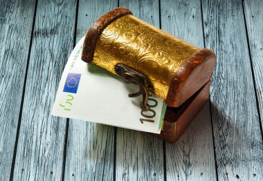 Treasure chest with euro banknote clipart
