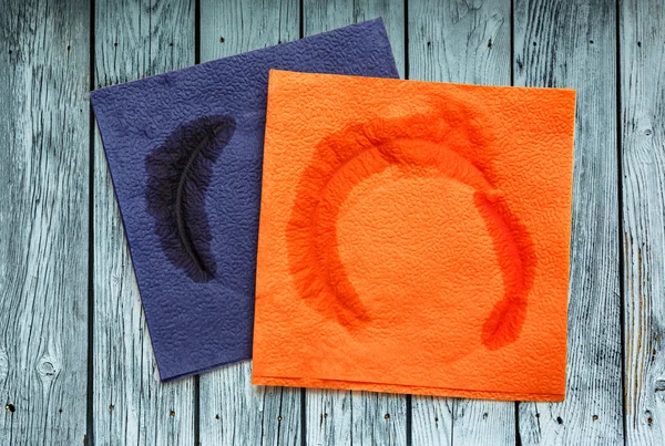 Two dirty blue and orange napkins — Stock Photo, Image