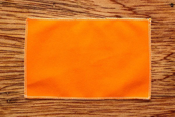 Оранжевая ткань для очков — стоковое фото