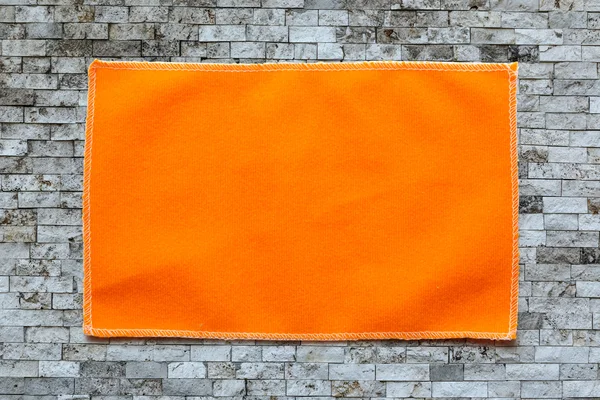 Оранжевая ткань для очков — стоковое фото
