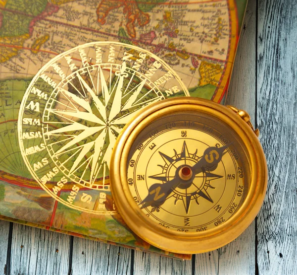 Book with retro golden compass — Stock Photo, Image