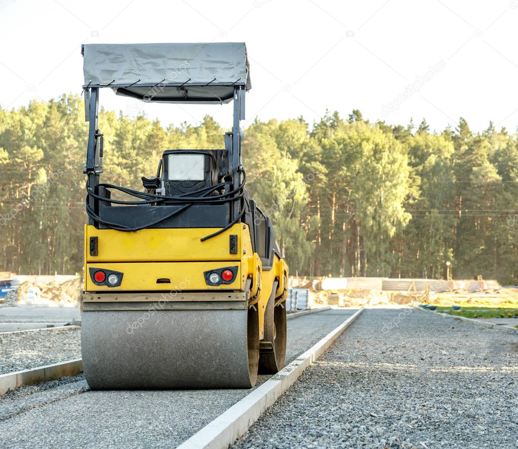 Road roller at road