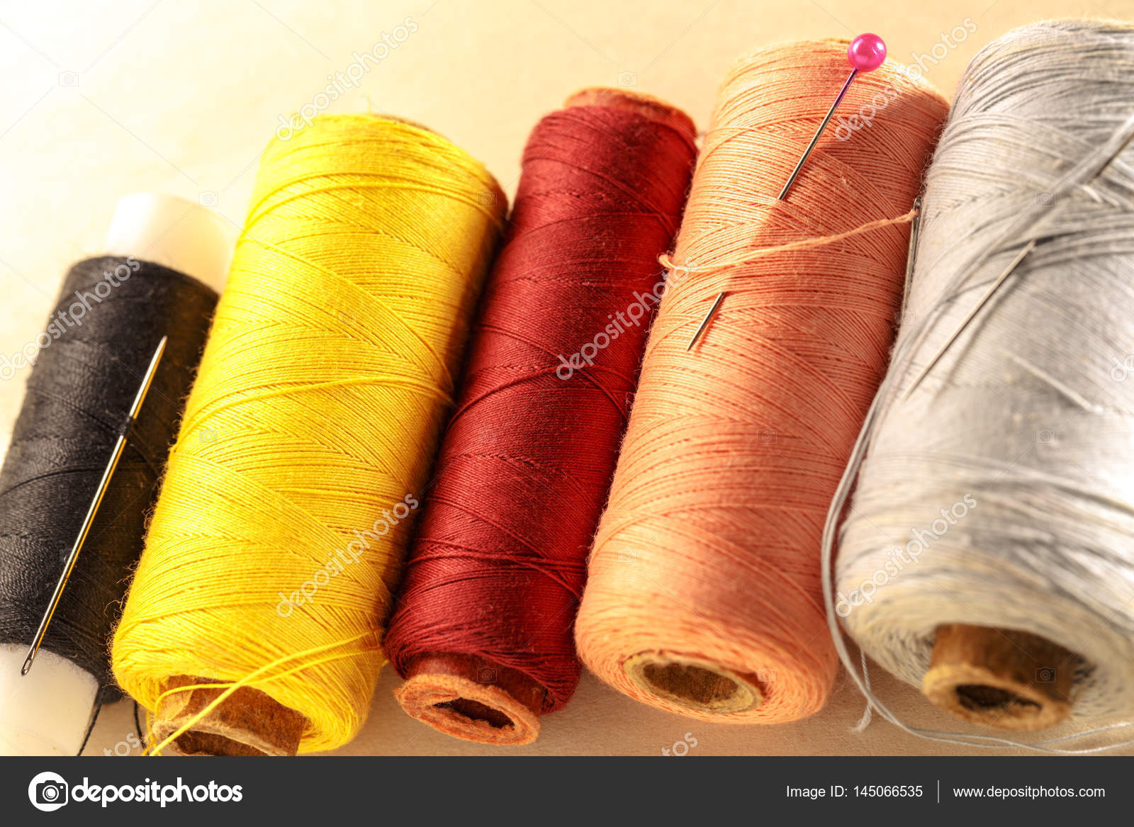 Thread bobbins and needles Stock Photo by ©Garsya 145066535