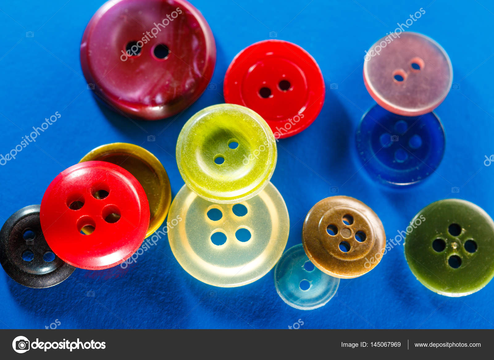 Colorful Buttons on White Background, Red, Yellow Green Blue or