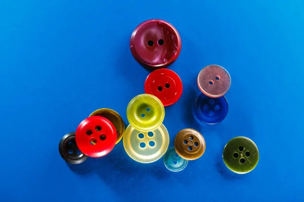 Colourful buttons on blue — Stock Photo, Image
