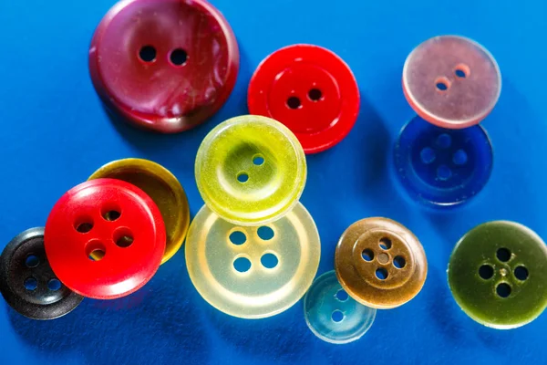 Colourful buttons on blue — Stock Photo, Image