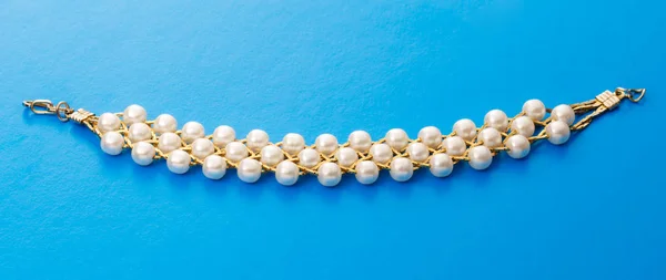 Wristband with white beads — Stock Photo, Image