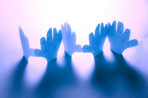 Paper hands in connection — Stock Photo, Image