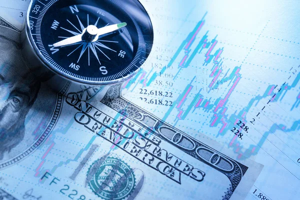 Begroting, dollars en kompas — Stockfoto
