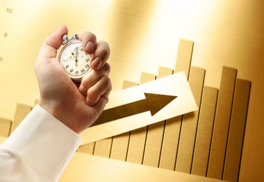 Diyagram kavramı ile ok ve elinde kronometre