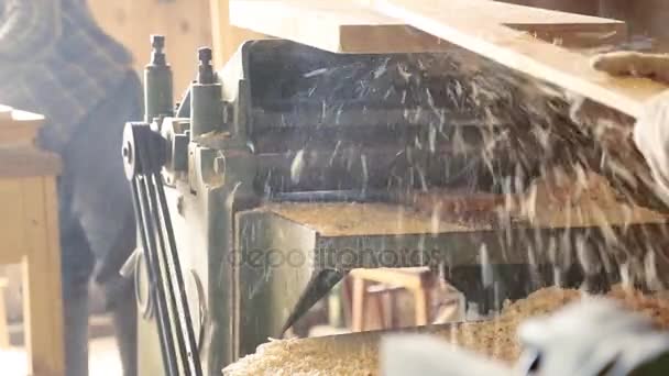 Gouging the wooden board's on machine — Stock Video