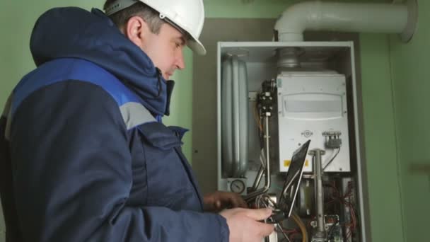 Worker Checking Gas Fire Boiler — Stock Video