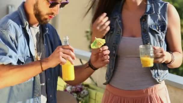 Woman and man dancing at rooftop party — Stock Video