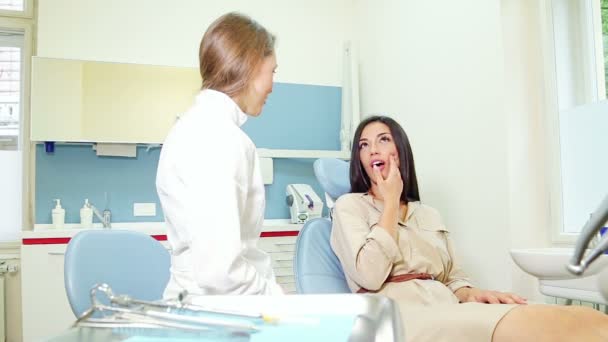 Woman with toothache at dentist — Stock Video