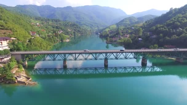 Cars driving on bridge over river — Stock Video