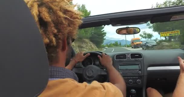 Male friends driving in convertible — Stock Video