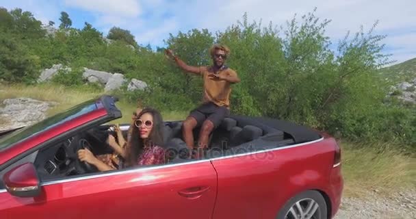 Friends partying in convertible — Stock Video