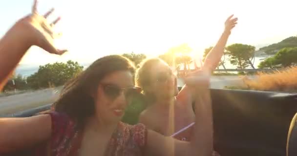 Women  riding in convertible car — Stock Video