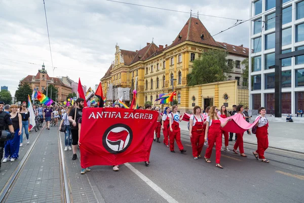 15th Zagreb pride. LGBTIQ activists holding pride banner. — Stock Photo, Image