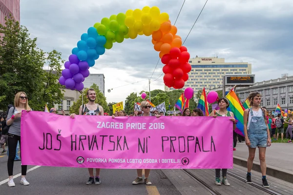 15th Zagreb pride. LGBTIQ activists holding pride banner. — Stock Photo, Image