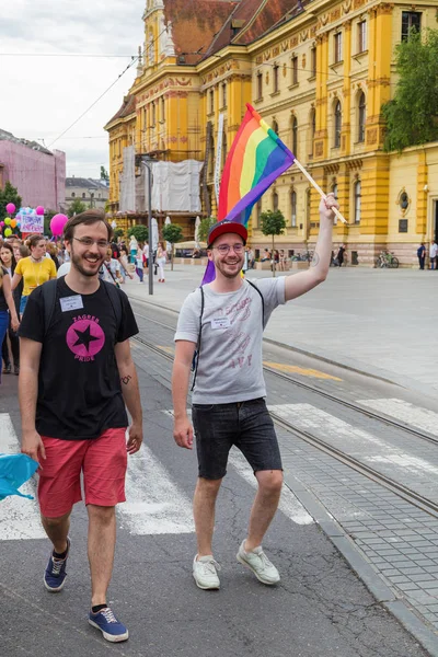 15th Zagreb pride. LGBTIQ activist holding flag. — Stock Photo, Image