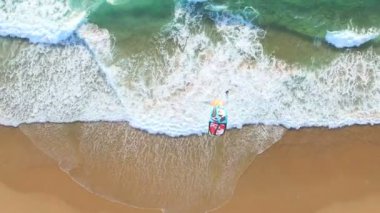 İnsanlar kitesurfing Guincho Beach