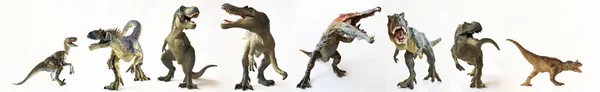 Група восьми динозаврів в ряд — стокове фото