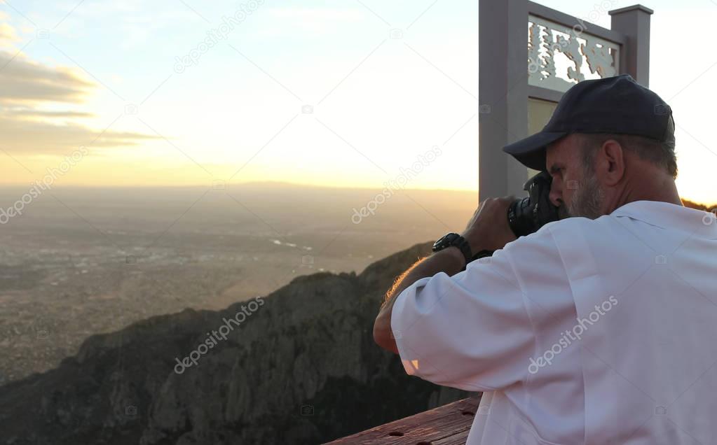 A Photographer on the Sandia Peak Aerial Tramway Observation Dec