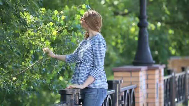 Beautiful Blonde In Jeans Shows OK And Smiles. — Stock Video