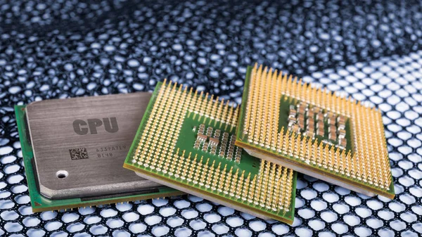 Computerprocessors op zeshoekige geweven gaas — Stockfoto