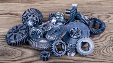 Heap of different gears on wood clipart