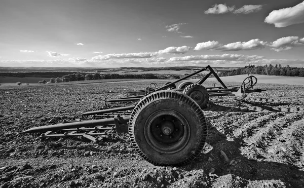 Idyllic black and white landscape with lonely harrow in field. Radenin, South Bohemia, Europe — Stock Photo, Image