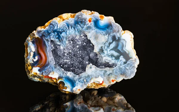 Beautiful hollow agate semi-precious stone with clear raw crystals inside geode — 스톡 사진