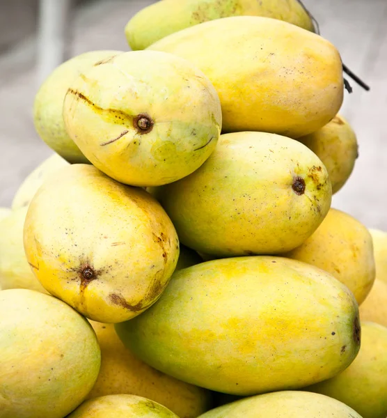 Barracuda yellow mango on the market in Saigon, Vietnam.