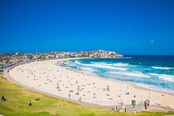 People relaxing on the Bondi beach in Sydney, Australia. Bondi beach is one of the most famous beach in the world