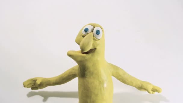 Yellow clay puppet fitness exercise — Stock Video