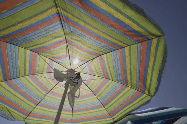 Under a Sun Umbrella — Stock Photo, Image