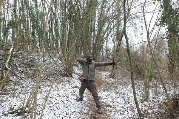 Snowy forest archer — Stock Photo, Image