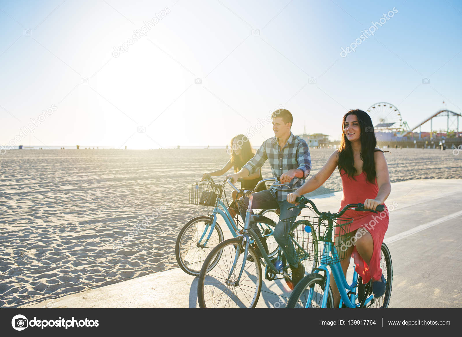 Three Friends Riding Bikes Stock Photo Three Friends Riding Bikes Stock Photo