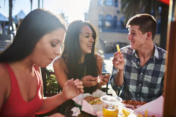 Couple sharing french fry — Stock Photo, Image