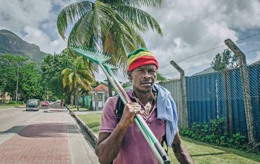 An aboriginal creole man is going on work, Victoria, Seychelles 15 Jul 2016 clipart
