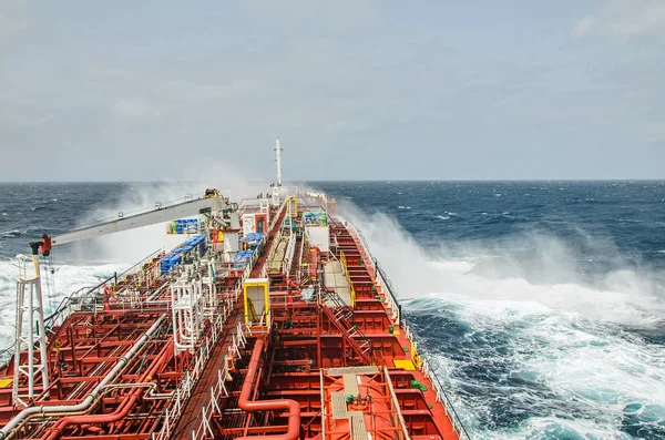 A tanker vessel against rage of the ocean