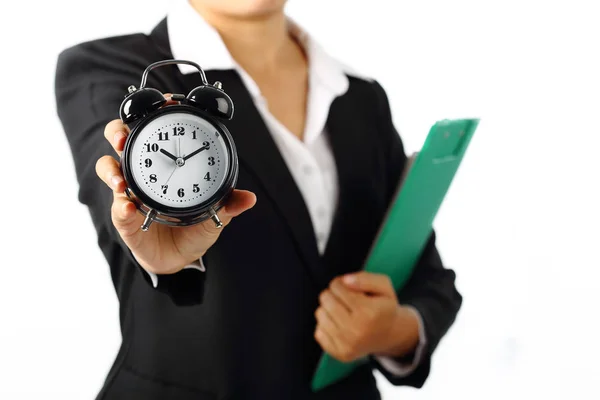 Mujer de negocios sosteniendo una alarma de temporizador 10.10 am aislado en blanco —  Fotos de Stock