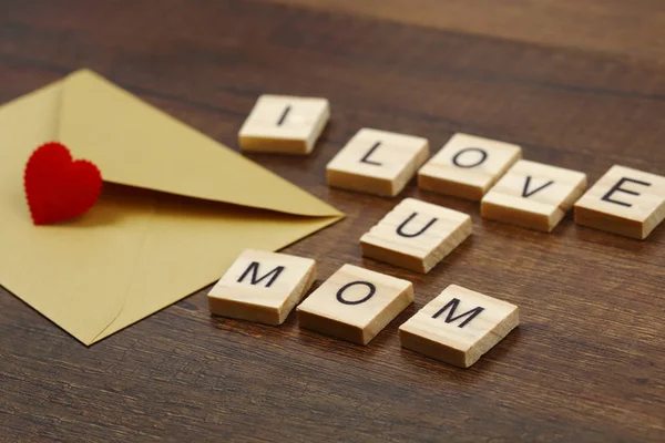 I love mom wording on old wood mother\'s day concept.
