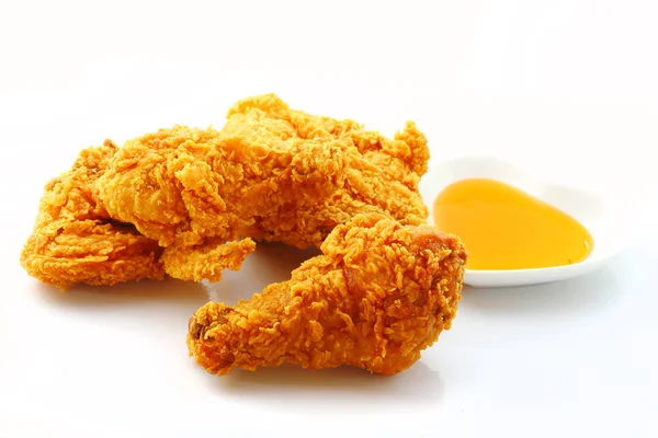 Fried chicken with sauce isolated over white — Stock Photo, Image