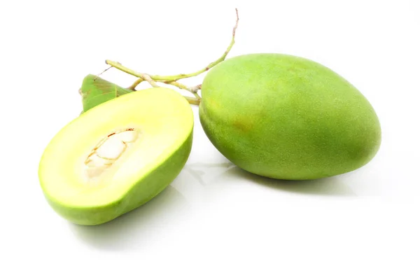 Green mango isolated on a white — Stock Photo, Image